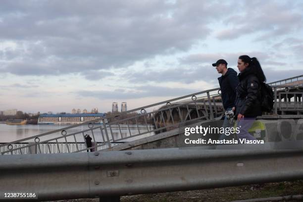 Kyiv residents walk on the Dnipro embankment on February 25, 2022 in Kyiv, Ukraine. Yesterday, Russia began a large-scale attack on Ukraine, with...