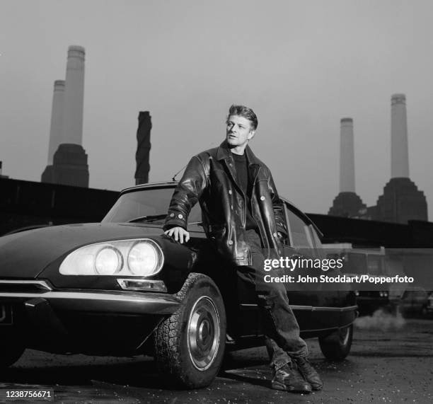 English actor Sean Bean photographed with a classic Citroen DS car on 24th January, 1996.