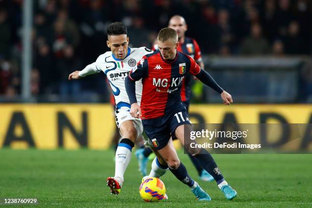 Lautaro Martinez of FC Internazionale and Albert Gudmundsson of Genoa CFC battle for the ball during the Serie A match between Genoa CFC and FC...