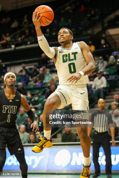 Clyde Trapp of the Charlotte 49ers jumps for a layup during a basketball game between the Charlotte 49ers and the Florida International Golden...