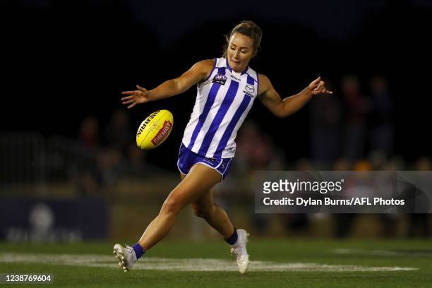 Nicole Bresnehan of the Kangaroos kicks the ball during the 2022 AFLW Round 08 match between the Melbourne Demons and the North Melbourne Kangaroos...