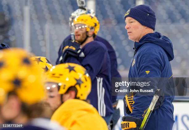 Head coach John Hynes of the Nashville Predators watches practice at Nissan Stadium on February 25, 2022 in Nashville, Tennessee.