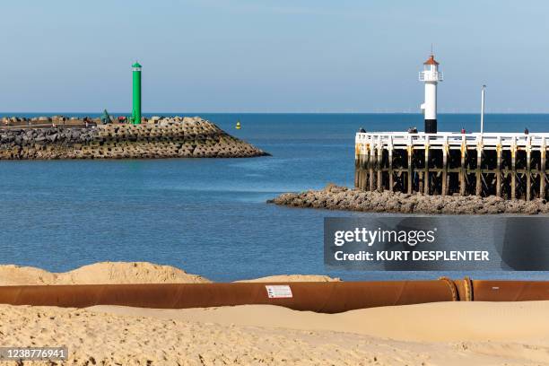 Illustration picture shows a press visit to works on the beach of Ostend, Saturday 26 February 2022. This week, the agency for Maritime Services and...