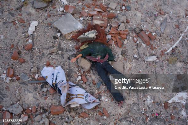 View of a child's doll among the rubble near the apartment block in 6A Lobanovsky Avenue which was hit with a missile on February 26, 2022 in Kyiv,...