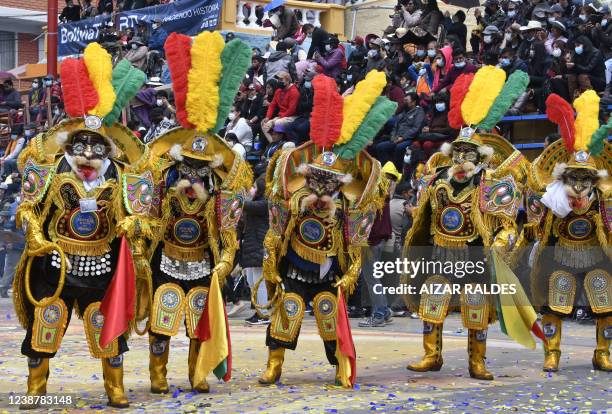 Dancers of the Morenada dance take part in the main parade of the Oruro carnival in Oruro, Bolivia, on February 26, 2022. - The Oruro carnival is...