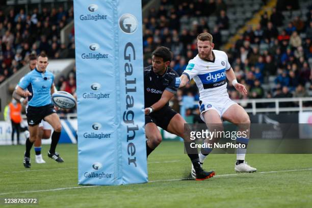 The ball bounces against a post while Matias Orlando of Newcastle Falcons chases through during the Gallagher Premiership match between Newcastle...