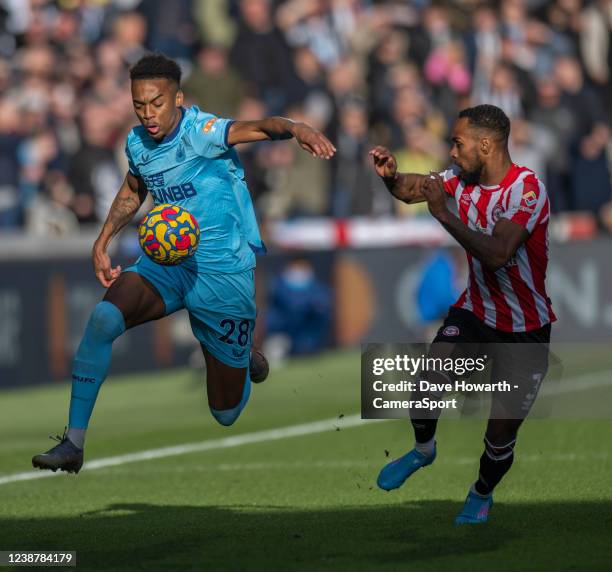 Newcastle United's Joe Willock under pressure from Brentford's Rico Henry during the Sky Bet Championship match between Blackpool and Reading at...