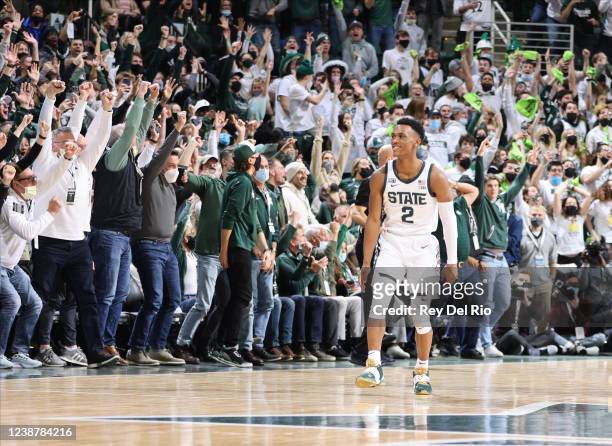 Tyson Walker of the Michigan State Spartans celebrates after hitting a three point shot against the Purdue Boilermakers at Breslin Center on February...