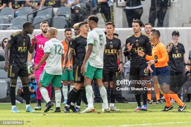 Various players state their case during the match between Los Angeles FC and Colorado Rapids at Banc of California Stadium in Los Angeles, California...