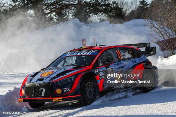 Thierry Neuville of Belgium and Martijn Wydaeghe of Belgium compete with their Hyundai Shell Mobis WRT Hyundai i20 N Rally1 during Day Three of the...