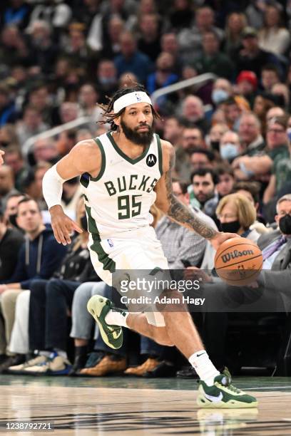 DeAndre Bembry of the Milwaukee Bucks dribbles the ball during the game against the Brooklyn Nets on February 26, 2022 at the Fiserv Forum Center in...