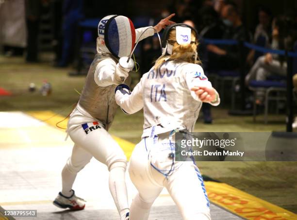 Marta Ricci of Italy fences Solene Butruille of France during the elimination rounds at the Women's Foil World Cup at the Fiesta Americana...