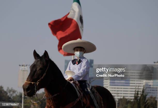 Charro riding a horse at the Hipódromo de Las Américas located in Mexico City, where some exhibitions were held, such as floreo de reata, el gallo...