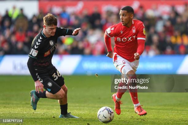 Max Lowe of Nottingham Forest battles with Alex Scott of Bristol City during the Sky Bet Championship match between Nottingham Forest and Bristol...