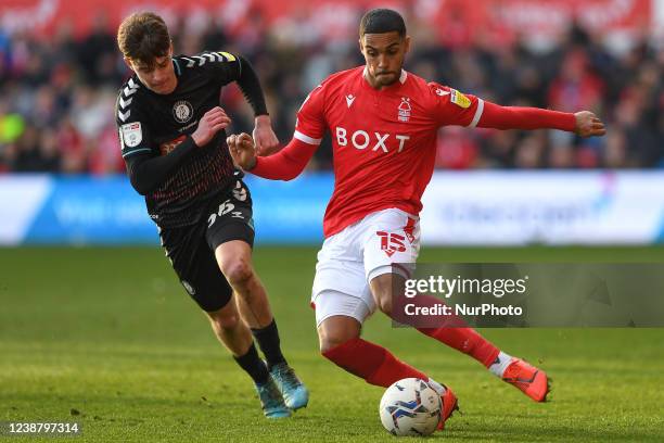 Max Lowe of Nottingham Forest battles with Alex Scott of Bristol City during the Sky Bet Championship match between Nottingham Forest and Bristol...