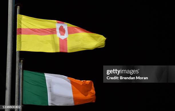 Cork , Ireland - 25 February 2022; The Irish tricolour and the Ulster flag fly in the wind before the Guinness U20 Six Nations Rugby Championship...