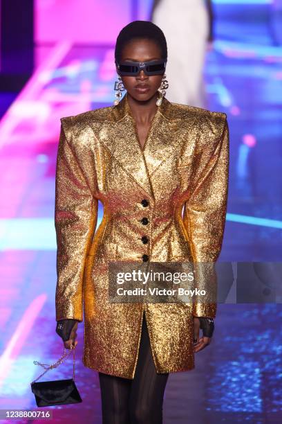 Model walks the runway at the Dolce & Gabbana fashion show during the Milan Fashion Week Fall/Winter 2022/2023 on February 26, 2022 in Milan, Italy.