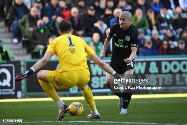 Daizen Maeda of Celtic gets one on one opportunity against goalkeeper Matt Macey of Hibernian during the Ladbrokes Scottish Premiership match between...