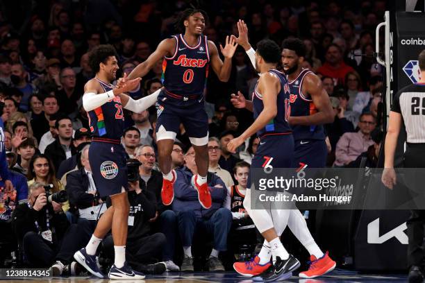 Tyrese Maxey of the Philadelphia 76ers celebrates with teammates after being fouled against the New York Knicks during the second half at Madison...