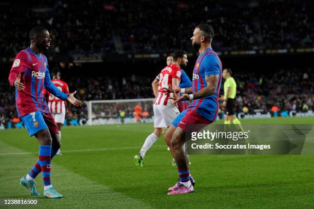 Memphis Depay of FC Barcelona celebrates 4-0 with Ousmane Dembele of FC Barcelona during the La Liga Santander match between FC Barcelona v Athletic...