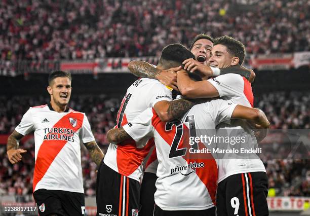 Esequiel Barco of River Plate celebrates with teammates after scoring the first goal of his team during a match between River Plate and Racing Club...
