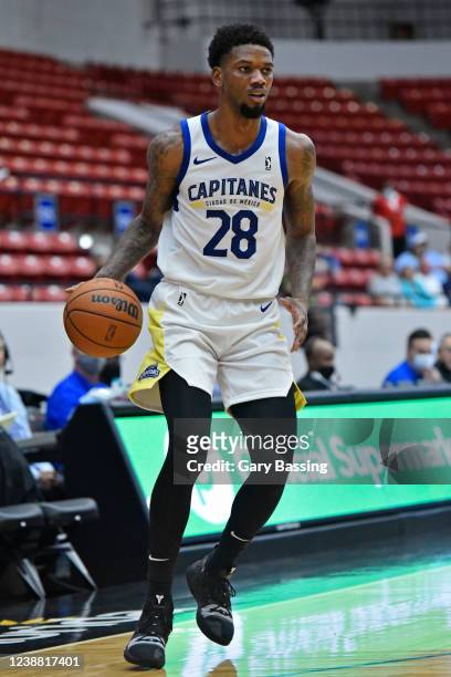 Alfonzo McKinnie of the Mexico City Capitanes handles the ball during the game against the Lakeland Magic on November 11, 2021 at RP Funding Center...