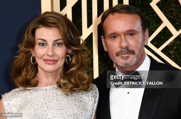 Singer Faith Hill and husband singer-actor Tim McGraw arrive for the 28th Annual Screen Actors Guild Awards at the Barker Hangar in Santa Monica,...