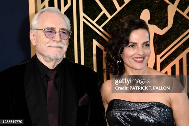 Scottish actor Brian Cox and wife actress Nicole Ansari-Cox arrive for the 28th Annual Screen Actors Guild Awards at the Barker Hangar in Santa...