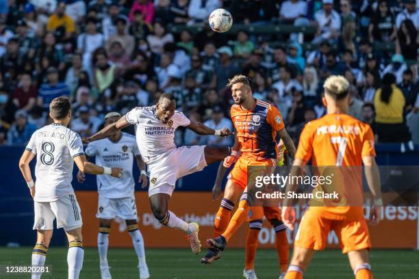 Sega Coulibaly of Los Angeles Galaxy battles Valentin Castellanos of New York City during the match against New York City FC at the Dignity Health...