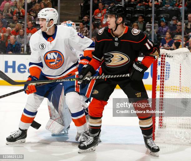 Troy Terry of the Anaheim Ducks battles for position against Noah Dobson of the New York Islanders during the game at Honda Center on February 27,...