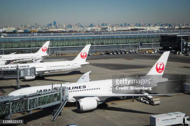 Aircraft operated by Japan Airlines Co., Ltd. On the tarmac at Haneda Airport in Tokyo, Japan, on Saturday, Feb. 26, 2022. The first phase of Japan's...
