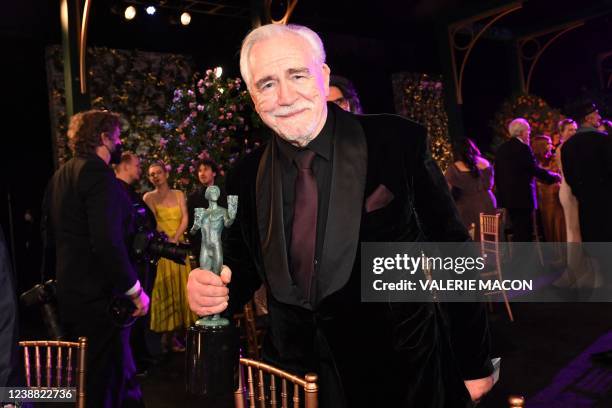 Scottish actor Brian Cox poses with the award for Outstanding Performance by an Ensemble in a Drama Series Succession during the 28th Annual Screen...