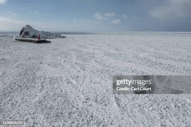 Drift ice covers the Sea of Okhotsk on February 23, 2022 in Shari, Japan. The temperature of the Sea of Okhotsk is believed to have increased by...