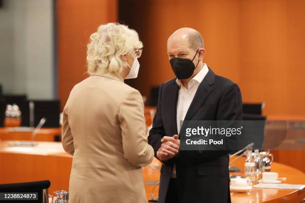Secretary of Defense, Christine Lambrecht and German Chancellor, Olaf Scholz arrive for a meeting of the government security cabinet on February 28,...