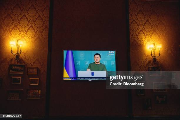 Daily televised broadcast by Ukraine's President Volodymyr Zelenskiy on a hotel television screen in Lviv, Ukraine, on Saturday, Feb. 26, 2022....