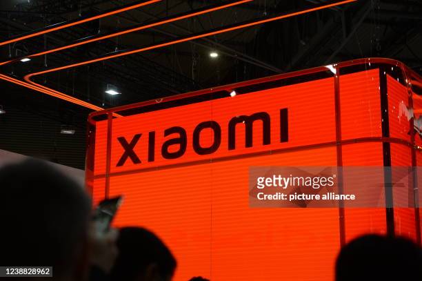 February 2022, Spain, Barcelona: The logo of Chinese smartphone provider Xiaomi is seen at the Mobile World Congress mobile trade show. Photo: Andrej...