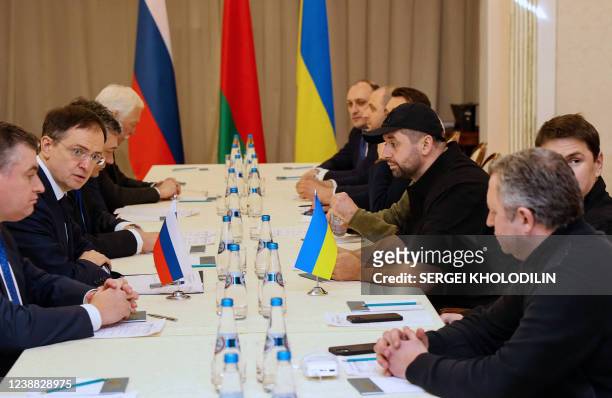 Members of delegations from Ukraine and Russia, including Russian presidential aide Vladimir Medinsky , Ukrainian presidential aide Mykhailo Podolyak...