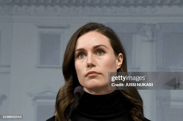 Finland's Prime Minister Sanna Marin addresses a press conference in Helsinki, Finland, on February 28, 2022 after the decision to supply arms to...