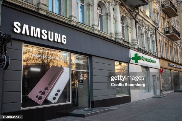 Closed Samsung Electronics Co. Store on a deserted street after a city-wide curfew was temporarily lifted in central Kyiv, Ukraine, Feb. 28, 2022....