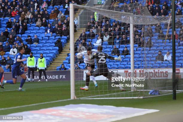 Aleksandar Mitrovic of Fulham heads for goal and scores his sides opening goal during the Sky Bet Championship match between Cardiff City and Fulham...