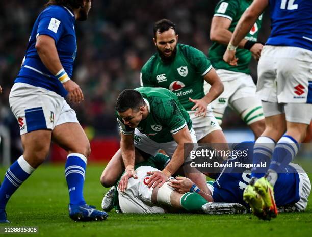 Dublin , Ireland - 27 February 2022; Jonathan Sexton of Ireland takes part in a ruck during the Guinness Six Nations Rugby Championship match between...