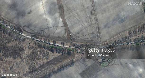 Maxar satellite imagery of southern end of large military convoy on the edge of Antonov Airport. 28feb2022_wv3. Please use: Satellite image 2022...