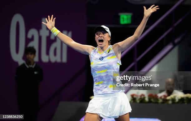 Iga Swiatek of Poland reacts to converting championship point against Anett Kontaveit of Estonia in the final of the Qatar TotalEnergies Open at the...