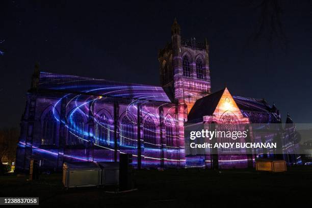 Paisley Abbey is illuminated during a photocall for an installation entitled 'About Us', created by 59 Productions, as part of the UNBOXED:...