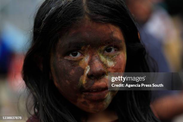 Child play with water and foam at carnival as part of La Armenia Carnival 2022 on February 28, 2022 in Quito, Ecuador.