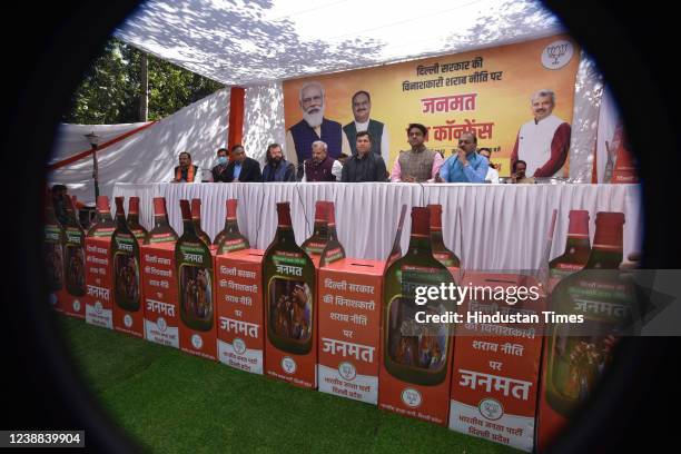 Delhi BJP State President Adesh Gupta, LOP Ramvir Singh Bidhuri, MPs Pravesh Sahib Singh and Hansraj Hans along with other senior leaders address a...