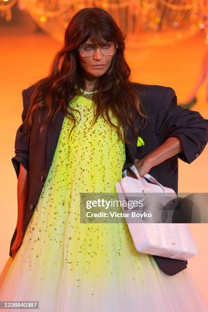 Helena Christensen closes Virgil Abloh's final show during the Off-White Womenswear Fall/Winter 2022-2023 show Spaceship Earth: An "Imaginary...