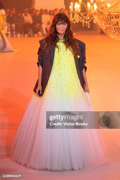 Helena Christensen closes Virgil Abloh's final show during the Off-White Womenswear Fall/Winter 2022-2023 show Spaceship Earth: An "Imaginary...