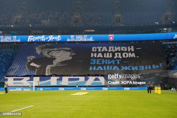 The audience wrote on the banner stadium is our home, zenit is our life during the Russian Premier League football match between Zenit Saint...