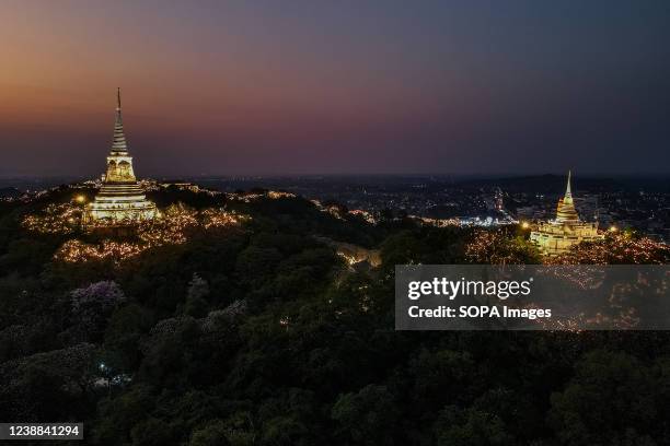 Phra That Chom Phet chedi is illuminated during a festival in Petchaburi. Phra Nakhon Khiri Festival takes place in Petchaburi, Thailand. The annual...